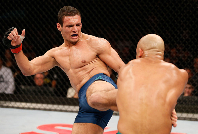 SAO PAULO, BRAZIL - MAY 31: (L-R) Marcio Alexandre kicks Warlley Alves in their middleweight fight during the UFC Fight Night event at the Ginasio do Ibirapuera on May 31, 2014 in Sao Paulo, Brazil. (Photo by Josh Hedges/Zuffa LLC/Zuffa LLC via Getty Ima