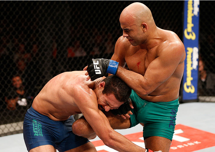 SAO PAULO, BRAZIL - MAY 31: (R-L) Warlley Alves knees Marcio Alexandre in their middleweight fight during the UFC Fight Night event at the Ginasio do Ibirapuera on May 31, 2014 in Sao Paulo, Brazil. (Photo by Josh Hedges/Zuffa LLC/Zuffa LLC via Getty Ima