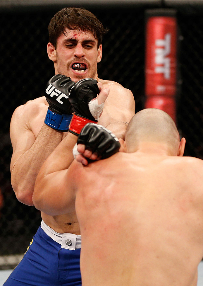 SAO PAULO, BRAZIL - MAY 31:  (L-R) Antonio Carlos Junior punches Vitor Miranda in their heavyweight fight during the UFC Fight Night event at the Ginasio do Ibirapuera on May 31, 2014 in Sao Paulo, Brazil. (Photo by Josh Hedges/Zuffa LLC/Zuffa LLC via Get