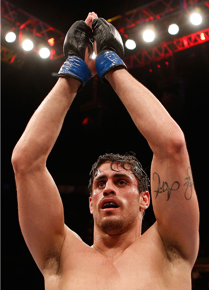 SAO PAULO, BRAZIL - MAY 31:  Antonio Carlos Junior celebrates after the conclusion of his heavyweight fight against Vitor Miranda during the UFC Fight Night event at the Ginasio do Ibirapuera on May 31, 2014 in Sao Paulo, Brazil. (Photo by Josh Hedges/Zuf