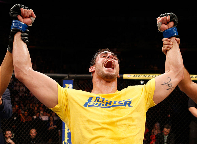 SAO PAULO, BRAZIL - MAY 31: Antonio Carlos Junior celebrates after his unanimous decision victory over Vitor Miranda in their heavyweight fight during the UFC Fight Night event at the Ginasio do Ibirapuera on May 31, 2014 in Sao Paulo, Brazil. (Photo by