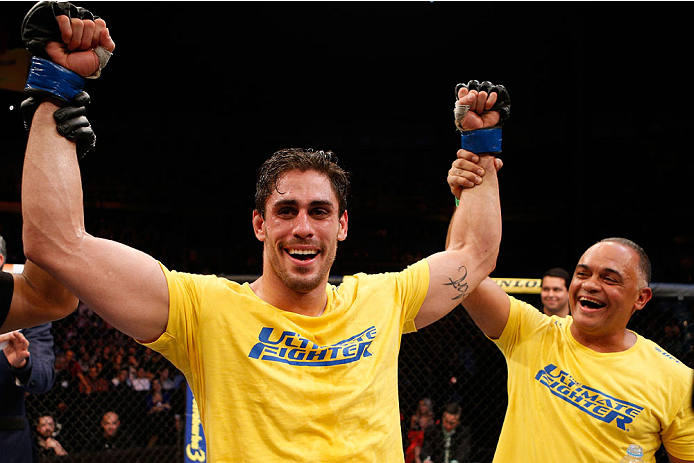 SAO PAULO, BRAZIL - MAY 31: Antonio Carlos Junior celebrates after his unanimous decision victory over Vitor Miranda in their heavyweight fight during the UFC Fight Night event at the Ginasio do Ibirapuera on May 31, 2014 in Sao Paulo, Brazil. (Photo by