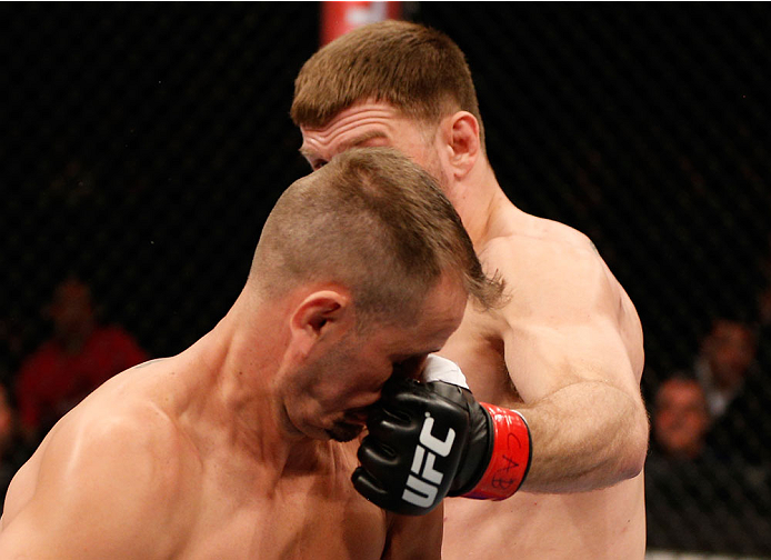 SAO PAULO, BRAZIL - MAY 31: (R-L) Stipe Miocic punches Fabio Maldonado in their heavyweight fight during the UFC Fight Night event at the Ginasio do Ibirapuera on May 31, 2014 in Sao Paulo, Brazil. (Photo by Josh Hedges/Zuffa LLC/Zuffa LLC via Getty Image