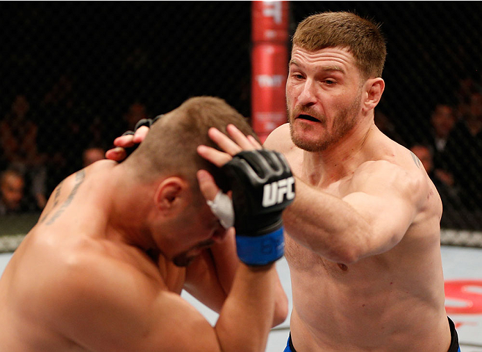 SAO PAULO, BRAZIL - MAY 31:  (R-L) Stipe Miocic punches Fabio Maldonado in their heavyweight fight during the UFC Fight Night event at the Ginasio do Ibirapuera on May 31, 2014 in Sao Paulo, Brazil. (Photo by Josh Hedges/Zuffa LLC/Zuffa LLC via Getty Imag