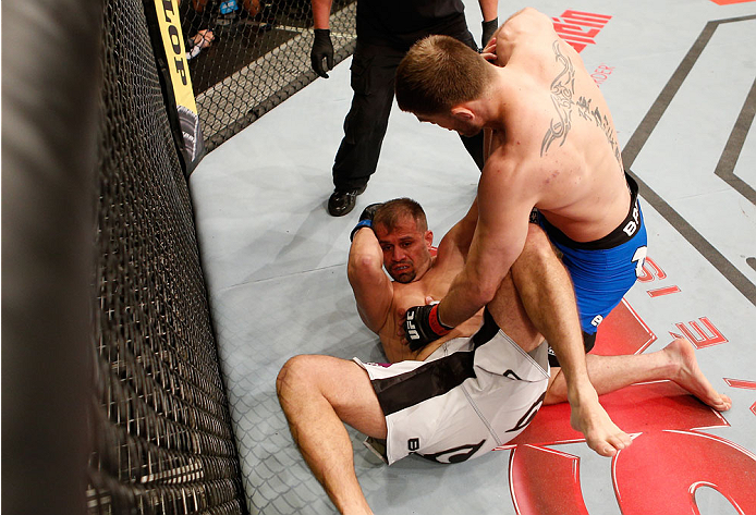 SAO PAULO, BRAZIL - MAY 31:  (R-L) Stipe Miocic punches Fabio Maldonado in their heavyweight fight during the UFC Fight Night event at the Ginasio do Ibirapuera on May 31, 2014 in Sao Paulo, Brazil. (Photo by Josh Hedges/Zuffa LLC/Zuffa LLC via Getty Imag