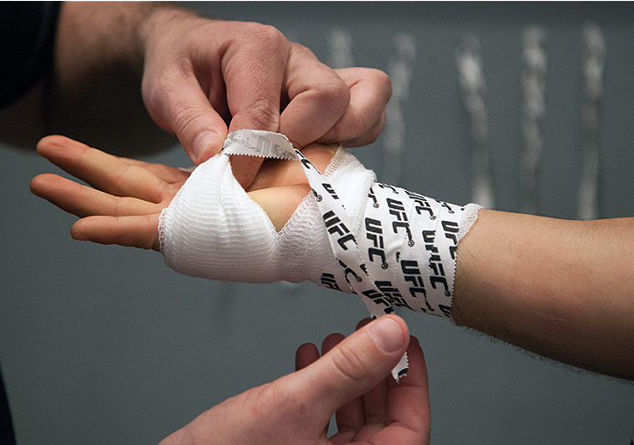 LAS VEGAS, NV - MARCH 27: Horacio Gutierrez gets his hands wrapped before facing Danny Salas during the filming of The Ultimate Fighter Latin America: Team Gastelum vs Team Escudero on March 27, 2015 in Las Vegas, Nevada. (Photo by Brandon Magnus/Zuffa