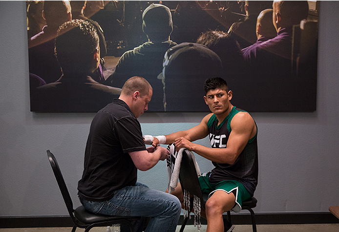 LAS VEGAS, NV - APRIL 10: Hector Aldana gets his hands wrapped before facing Alvaro Herrera during the filming of The Ultimate Fighter Latin America: Team Gastelum vs Team Escudero on April 10, 2015 in Las Vegas, Nevada. (Photo by Brandon Magnus/Zuffa L
