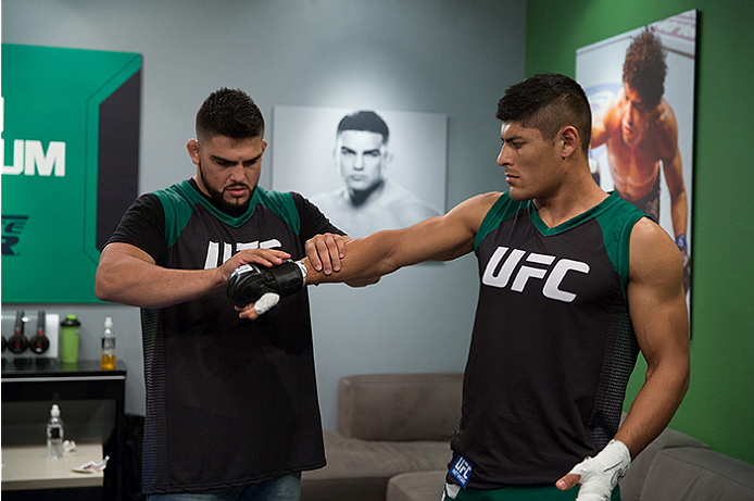 LAS VEGAS, NV - APRIL 10: Hector Aldana gets his hands wrapped before facing Alvaro Herrera during the filming of The Ultimate Fighter Latin America: Team Gastelum vs Team Escudero on April 10, 2015 in Las Vegas, Nevada. (Photo by Brandon Magnus/Zuffa L
