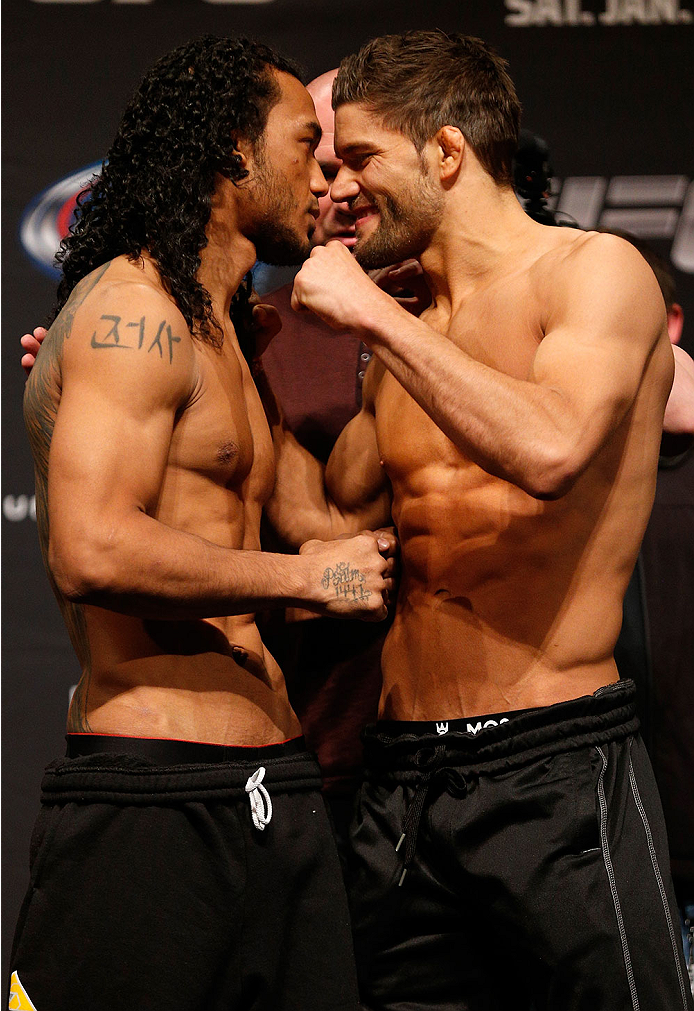 CHICAGO, IL - JANUARY 24: (L-R) Opponents Benson Henderson and Josh Thomson face off during the UFC weigh-in event at the Chicago Theatre on January 24, 2014 in Chicago, Illinois. (Photo by Josh Hedges/Zuffa LLC/Zuffa LLC via Getty Images)