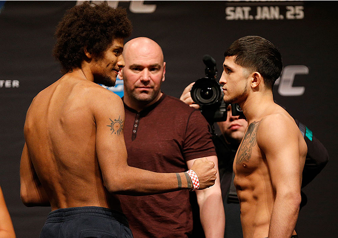 CHICAGO, IL - JANUARY 24: (L-R) Opponents Alex Caceres and Sergio Pettis face off during the UFC weigh-in event at the Chicago Theatre on January 24, 2014 in Chicago, Illinois. (Photo by Josh Hedges/Zuffa LLC/Zuffa LLC via Getty Images)
