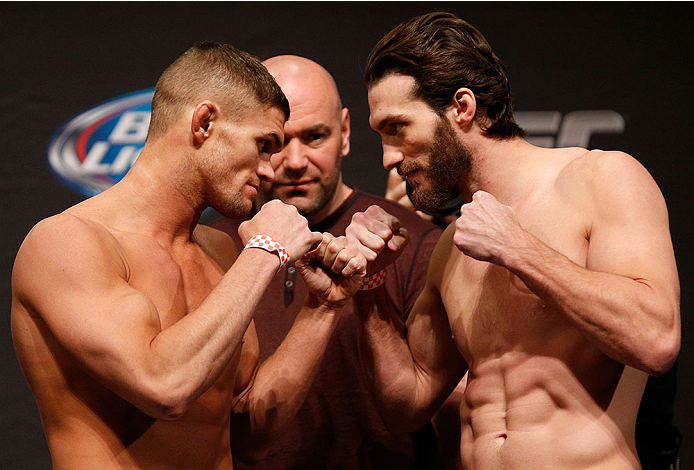 CHICAGO, IL - JANUARY 24: (L-R) Opponents Daron Cruickshank and Mike Rio face off during the UFC weigh-in event at the Chicago Theatre on January 24, 2014 in Chicago, Illinois. (Photo by Josh Hedges/Zuffa LLC/Zuffa LLC via Getty Images)