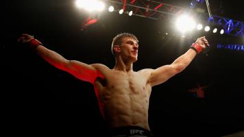  Arnold 'Almighty' Allen of England celebrates his victory after beating Yaotzin Meza of the USA in their Featherweight bout during the UFC Fight Night held at at Indigo at The O2 Arena on February 27, 2016 in London, England. (Photo by Dean Mouhtaropoulos/Zuffa LLC/Zuffa LLC)