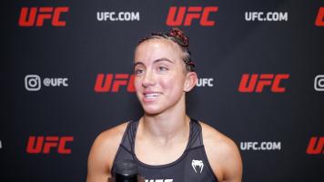 Maycee Barber reacts with UFC.com after her victory against Jessica Eye at UFC 276: Adesanya vs Cannonier