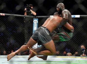 Curtis Blaydes takes down Jairzinho Rozenstruik of Suriname in their heavyweight fight during the UFC 266 event on September 25, 2021 in Las Vegas, Nevada. (Photo by Chris Unger/Zuffa LLC)