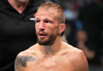TJ Dillashaw returns to his corner after the first round of his UFC bantamweight championship fight against Aljamain Sterling during the UFC 280 event at Etihad Arena on October 22, 2022 in Abu Dhabi, United Arab Emirates. (Photo by Chris Unger/Zuffa LLC)