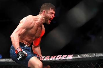 Calvin Kattar celebrates his win by TKO against Shane Burgos in their Featherweight fight during UFC 220 at TD Garden on January 20, 2018 in Boston, Massachusetts. (Photo by Mike Lawrie/Getty Images)