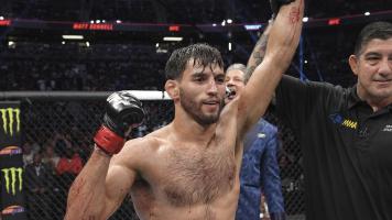 Matt Schnell reacts after his victory over Sumudaerji of China in a flyweight fight during the UFC Fight Night event at UBS Arena