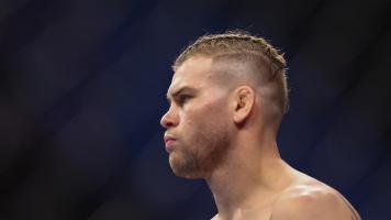 Jake Matthews of Australia looks on before fighting Andre Fialho of Portugal during their Welterweight Fight at Singapore Indoor Stadium on June 12, 2022 in Singapore. (Photo by Yong Teck Lim/Getty Images)