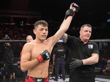  Maheshate of China reacts after his knockout victory over Steve Garcia in a lightweight fight during the UFC 275 event at Singapore Indoor Stadium on June 12, 2022 in Singapore. (Photo by Jeff Bottari/Zuffa LLC)