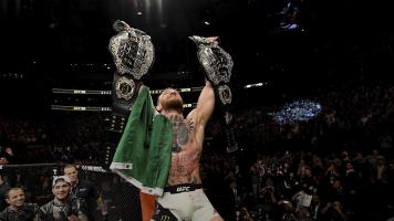 Conor McGregor of Ireland celebrates his KO victory over Eddie Alvarez of the United States in their lightweight championship bout during the UFC 205 event at Madison Square Garden on November 12, 2016 in New York City. (Photo by Jeff Bottari/Zuffa LLC)