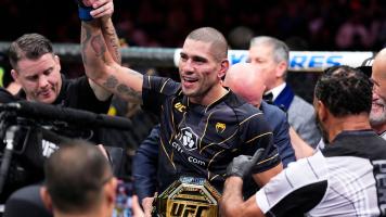 Alex Pereira of Brazil reacts after his TKO victory over Israel Adesanya of Nigeria in the UFC middleweight championship bout during the UFC 281 event at Madison Square Garden on November 12, 2022 in New York City. (Photo by Chris Unger/Zuffa LLC)