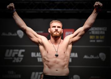 Jan Blachowicz of Poland poses on the scale during the UFC 267 ceremonial weigh-in at Etihad Arena on October 29, 2021 in Yas Island, Abu Dhabi, United Arab Emirates. (Photo by Chris Unger/Zuffa LLC)