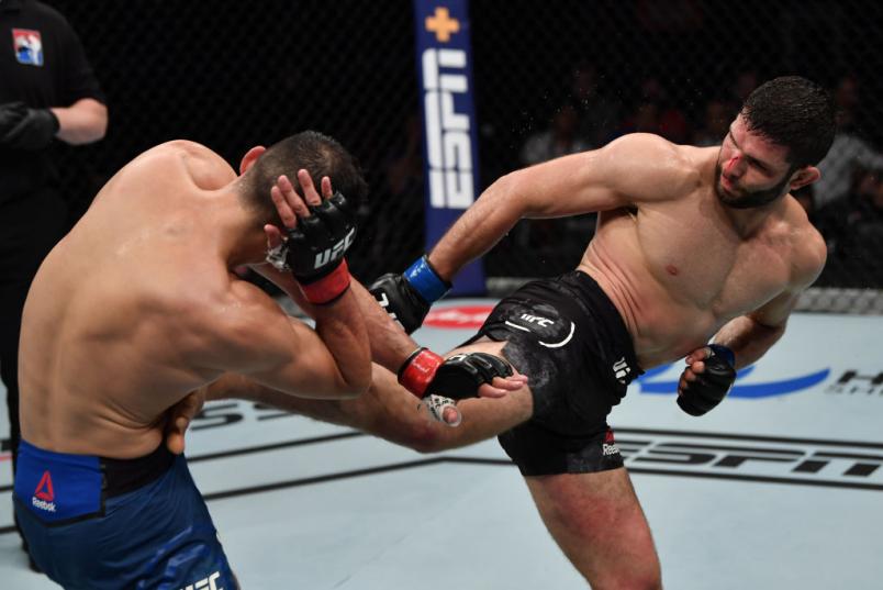 SHENZHEN, CHINA - AUGUST 31: (R-L) Thiago Moises of Brazil kicks Damir Ismagulov of Russia during the UFC Fight Night event at Shenzhen Universiade Sports Centre on August 31, 2019 in Shenzhen, China. (Photo by Brandon Magnus/Zuffa LLC)
