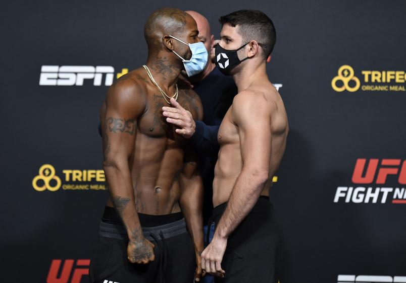 Opponents Bobby Green and Thiago Moises of Brazil face off during the UFC Fight Night weigh-in at UFC APEX on October 30, 2020 in Las Vegas, Nevada. (Photo by Jeff Bottari/Zuffa LLC via Getty Images)