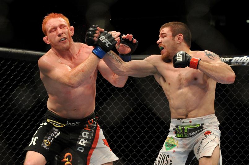 NEWARK, NJ - MARCH 27: UFC fighter Jim Miller (R) battles Mark Bocek (L) during their Lightweight bout at UFC 111 at the Prudential Center on March 27, 2010 in Newark, New Jersey. Miller won by Unanimous Decision at 5:00 of the 3rd round. (Photo by Jon Kopaloff/Zuffa, LLC via Getty Images)