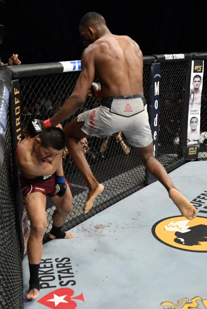 Neil Magny knees Li Jingliang of China in their welterweight fight during the UFC 248 event at T-Mobile Arena on March 07, 2020 in Las Vegas, Nevada. (Photo by Jeff Bottari/Zuffa LLC)