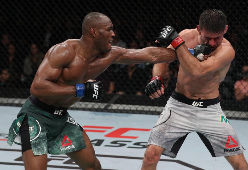 Kamaru Usman of Nigeria punches Demian Maia of Brazil in their welterweight bout during the UFC Fight Night event at Movistar Arena on May 19, 2018 in Santiago, Chile. (Photo by Buda Mendes/Zuffa LLC/Zuffa LLC via Getty Images)