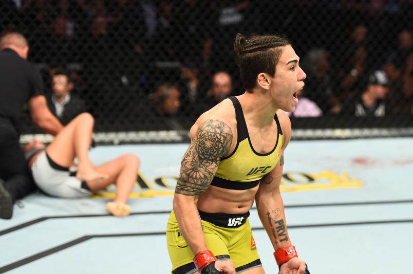 DALLAS, TX - SEPTEMBER 08: (R-L) Jessica Andrade of Brazil celebrates after knocking out Karolina Kowalkiewicz of Poland in their women's strawweight fight during the UFC 228 event at American Airlines Center on September 8, 2018 in Dallas, Texas. (Photo by Josh Hedges/Zuffa LLC/Zuffa LLC via Getty Images)