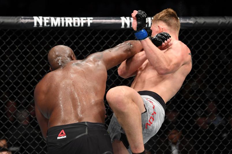 LAS VEGAS, NV - OCTOBER 06: Derrick Lewis punches Alexander Volkov of Russia in their heavyweight bout during the UFC 229 event inside T-Mobile Arena on October 6, 2018 in Las Vegas, Nevada. (Photo by Josh Hedges/Zuffa LLC/Zuffa LLC)