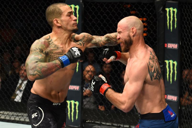 AUSTIN, TX - FEBRUARY 18: Yancy Medeiros (L) punches Donald Cerrone in their welterweight bout during the UFC Fight Night event at Frank Erwin Center on February 18, 2018 in Austin, Texas. (Photo by Josh Hedges/Zuffa LLC/Zuffa LLC via Getty Images)