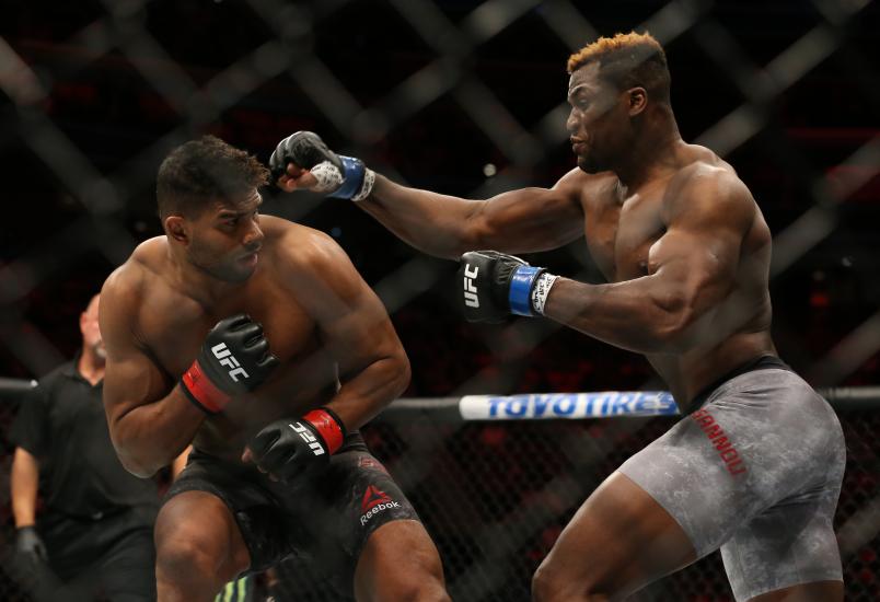 DETROIT, MI - DECEMBER 2: Francis Ngannou (R) punches Alistair Overeem during the UFC 218 event at Little Caesars Arena on December 2, 2017 in Detroit, Michigan. (Photo by Rey Del Rio/Zuffa LLC via Getty Images)