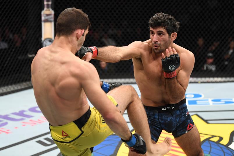 DENVER, CO - NOVEMBER 10: (R-L) Beneil Dariush of Iran punches Thiago Moises of Brazil in their lightweight bout during the UFC Fight Night event inside Pepsi Center on November 10, 2018 in Denver, Colorado. (Photo by Josh Hedges/Zuffa LLC/Zuffa LLC via Getty Images)