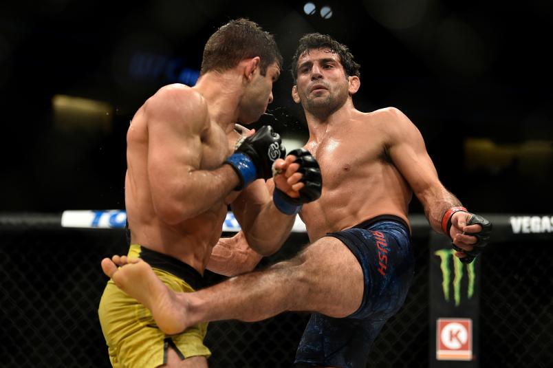 DENVER, CO - NOVEMBER 10: (R-L) Beneil Dariush of Iran kicks Thiago Moises of Brazil in their lightweight bout during the UFC Fight Night event inside Pepsi Center on November 10, 2018 in Denver, Colorado. (Photo by Chris Unger/Zuffa LLC/Zuffa LLC via Getty Images)