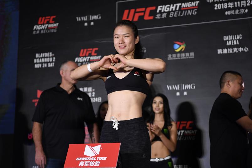BEIJING, CHINA - NOVEMBER 23: Weili Zhang of China poses on the scale during the UFC Fight Night weigh-in on November 23, 2018 in Beijing, China. (Photo by Jeff Bottari/Zuffa LLC/Zuffa LLC via Getty Images)