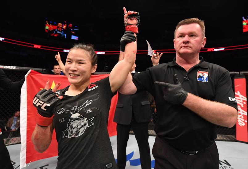 BEIJING, CHINA - NOVEMBER 24: Weili Zhang of China celebrates after her submission victory over Jessica Aguilar in their women's strawweight bout during the UFC Fight Night event inside Cadillac Arena on November 24, 2018 in Beijing, China. (Photo by Jeff Bottari/Zuffa LLC/Zuffa LLC via Getty Images)