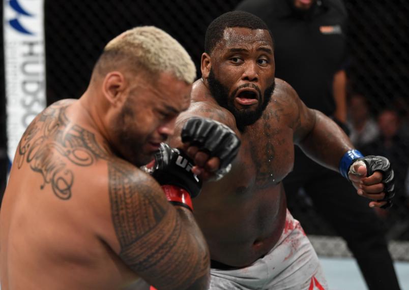 ADELAIDE, AUSTRALIA - DECEMBER 02: (R-L) Justin Willis punches Mark Hunt of New Zealand in their heavyweight bout during the UFC Fight Night event inside Adelaide Entertainment Centre on December 2, 2018 in Adelaide, Australia. (Photo by Jeff Bottari/Zuffa LLC/Zuffa LLC via Getty Images)