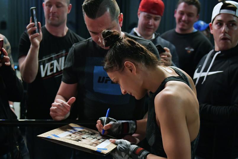 Karolina Kowalkiewicz signs autographs for fans after her work out prior to her fight against Michelle Waterson at 2300 Arena on March 27, 2019 in Philadelphia, Pennsylvania. (Photo by Drew Hallowell/Zuffa LLC/Zuffa LLC)