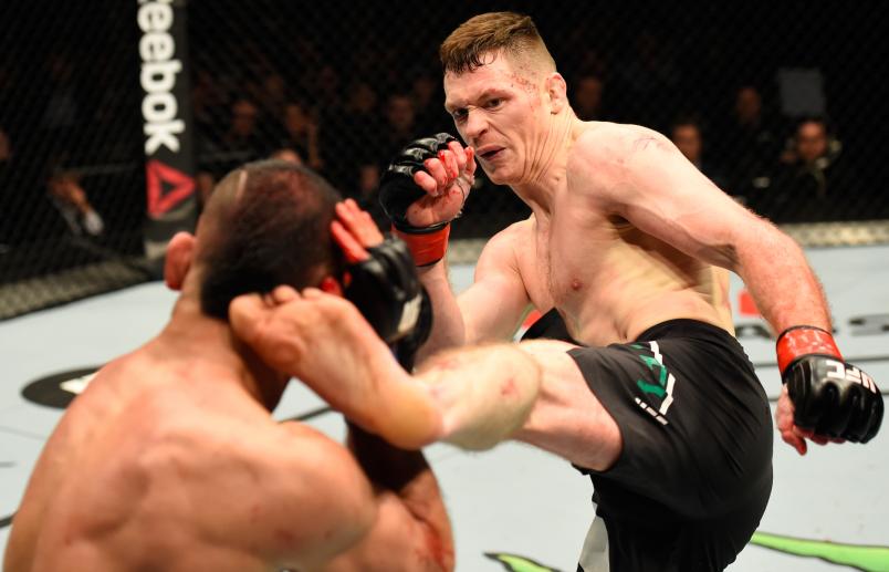 LONDON, ENGLAND - MARCH 18: (R-L) Joe Duffy of Ireland kicks Reza Madadi of Iran in their lightweight fight during the UFC Fight Night event at The O2 arena on March 18, 2017 in London, England. (Photo by Josh Hedges/Zuffa LLC/Zuffa LLC via Getty Images)