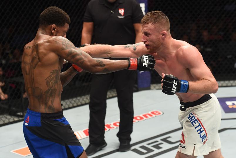 LAS VEGAS, NV - JULY 07: (R-L) Justin Gaethje punches Michael Johnson after their lightweight bout during The Ultimate Fighter Finale at T-Mobile Arena on July 7, 2017 in Las Vegas, Nevada. (Photo by Brandon Magnus/Zuffa LLC/Zuffa LLC via Getty Images)