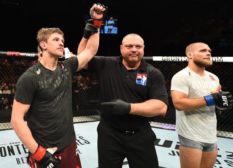 LIVERPOOL, ENGLAND - MAY 27: (L-R) Arnold Allen of England celebrates his submission victory over Mads Burnell in their featherweight bout during the UFC Fight Night event at ECHO Arena on May 27, 2018 in Liverpool, England. (Photo by Josh Hedges/Zuffa LLC/Zuffa LLC via Getty Images)