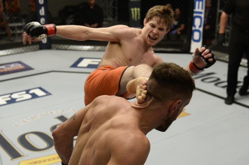 Bryce Mitchell (L) kicks Jay Cucciniello during the filming of The Ultimate Fighter: Undefeated on February 14, 2017 in Las Vegas, Nevada. (Photo by Brandon Magnus/Zuffa LLC)
