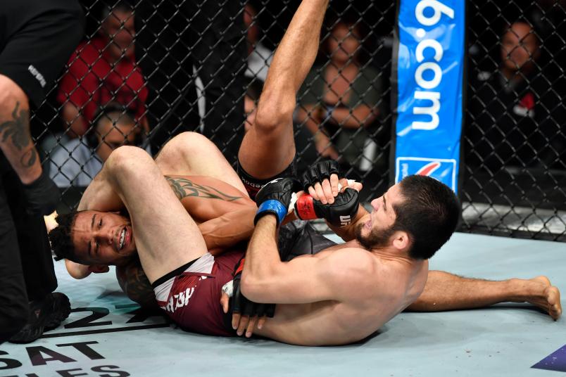 Islam Makhachev of Russia secures an arm bar submission against Kajan Johnson of Canada in their lightweight bout during the UFC Fight Night event at Scotiabank Saddledome on July 28, 2018 in Calgary, Alberta, Canada. (Photo by Jeff Bottari/Zuffa LLC/Zuffa LLC via Getty Images)