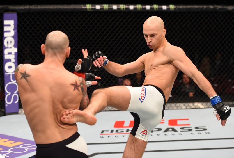 NEWARK, NJ - JANUARY 30: (R-L) Alexander Yakovlev kicks George Sullivan in their welterweight bout during the UFC Fight Night event at the Prudential Center on January 30, 2016 in Newark, New Jersey. (Photo by Josh Hedges/Zuffa LLC/Zuffa LLC via Getty Images)