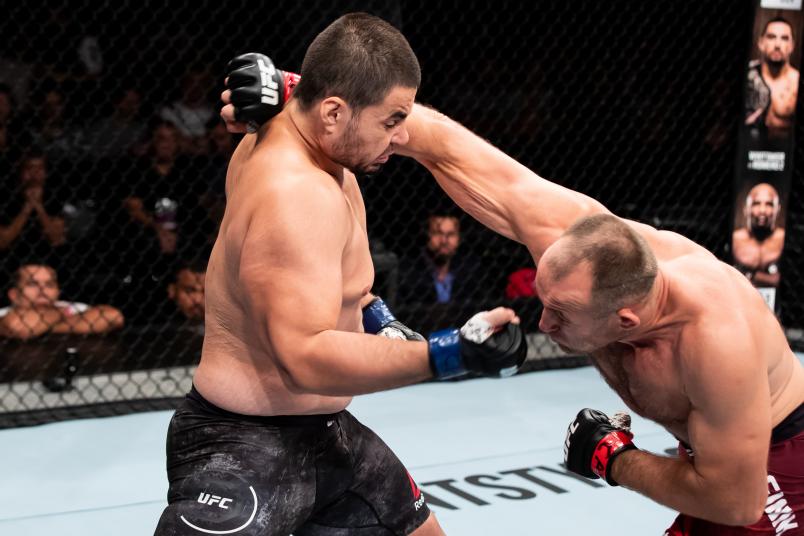 RIO DE JANEIRO, BRAZIL - MAY 12: Aleksei Oleinik (R) of Russia punches Junior Albini of Brazil in their heavyweight bout during the UFC 224 event at Jeunesse Arena on May 12, 2018 in Rio de Janeiro, Brazil. (Photo by Buda Mendes/Zuffa LLC/Zuffa LLC)