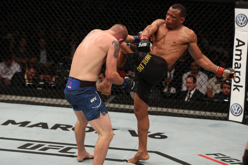 SAO PAULO, BRAZIL - SEPTEMBER 22: (R-L) Francisco Trinaldo of Brazil lands a knee to the body of Evan Dunham in their lightweight bout during the UFC Fight Night event at Ibirapuera Gymnasium on September 22, 2018 in Sao Paulo, Brazil. (Photo by Buda Mendes/Zuffa LLC/Zuffa LLC via Getty Images)