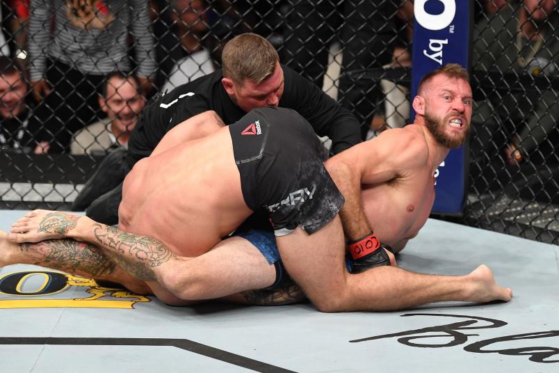 (R-L) Donald Cerrone submits Mike Perry by arm bar in their welterweight bout during the UFC Fight Night event inside Pepsi Center on November 10, 2018 in Denver, Colorado. (Photo by Josh Hedges/Zuffa LLC/Zuffa LLC via Getty Images)